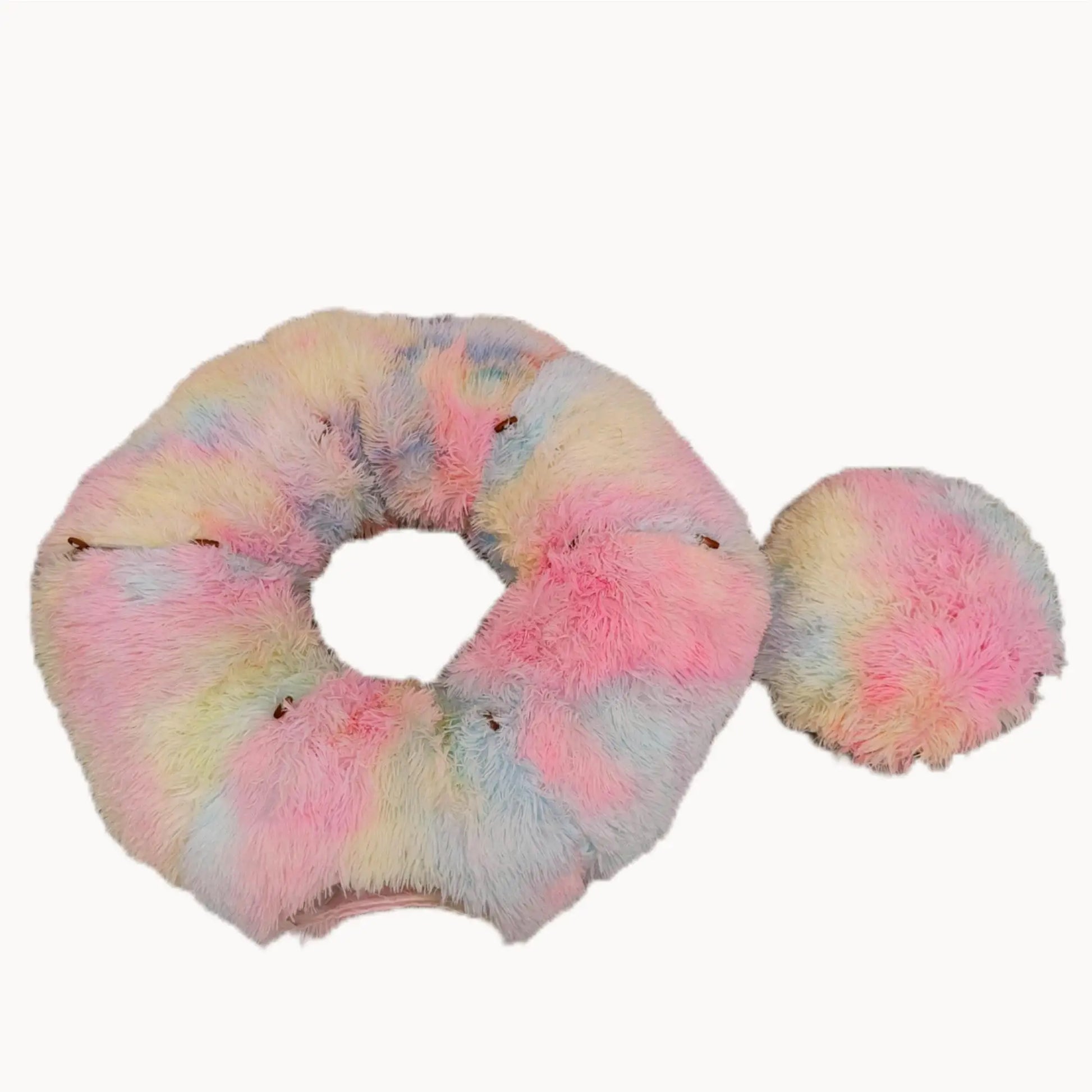 Multicolored scrunchie with pom-pom on a white background